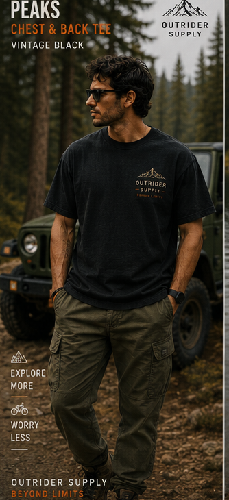 Model in a Peaks graphic tee beside an off-road expedition truck